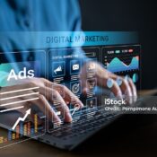 Digital marketing strategy and online advertising concept, hands typing on a laptop with virtual dashboard, SEO, social media, email campaign, data analytics, performance metrics, business promotion